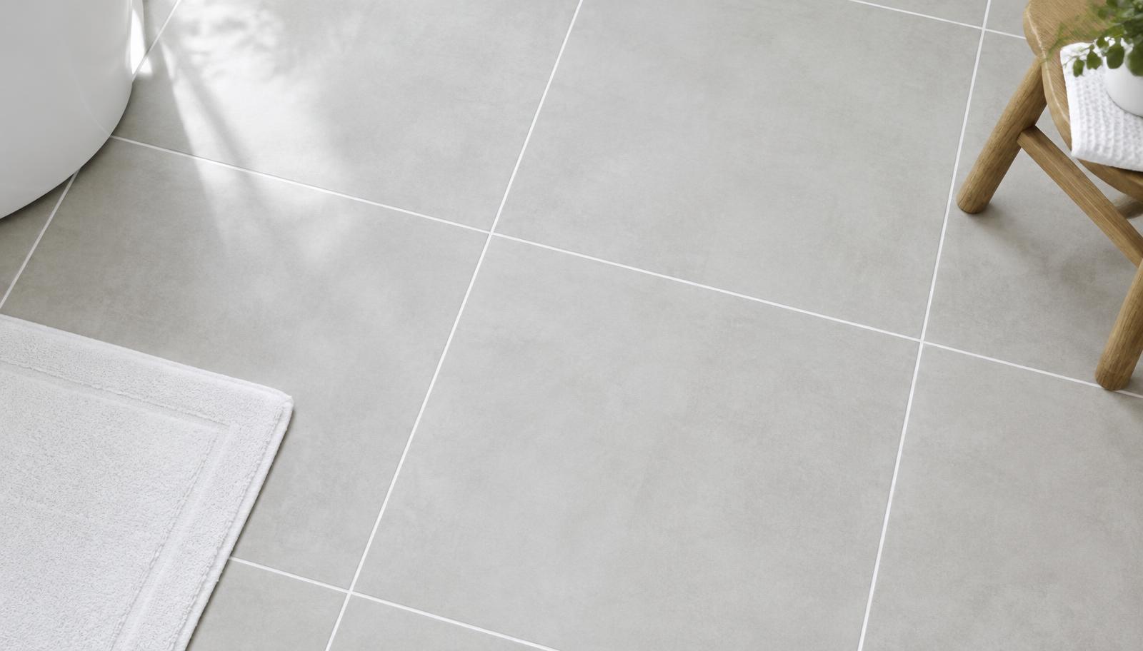 Bathroom tile floor cleaned with the SpinPro — After